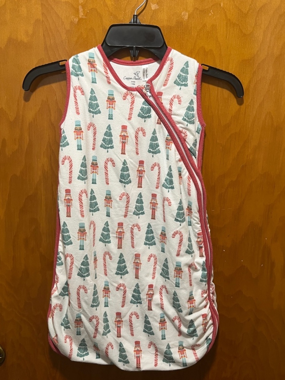Copper Pearl Holiday Nutcracker Sleep Sack in White and Red